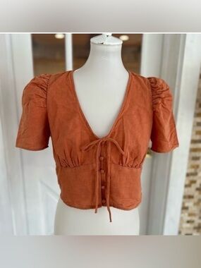 Levi's orange crop top with puff sleeve